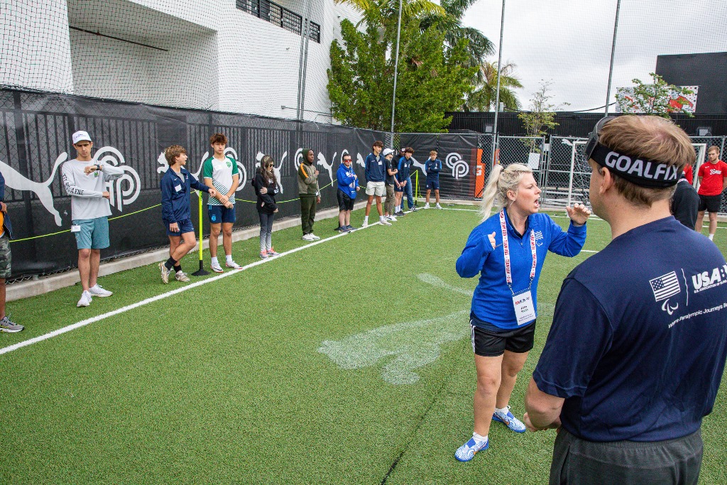USA Blind Soccer Head Coach Katie Smith provides instruction to the participants